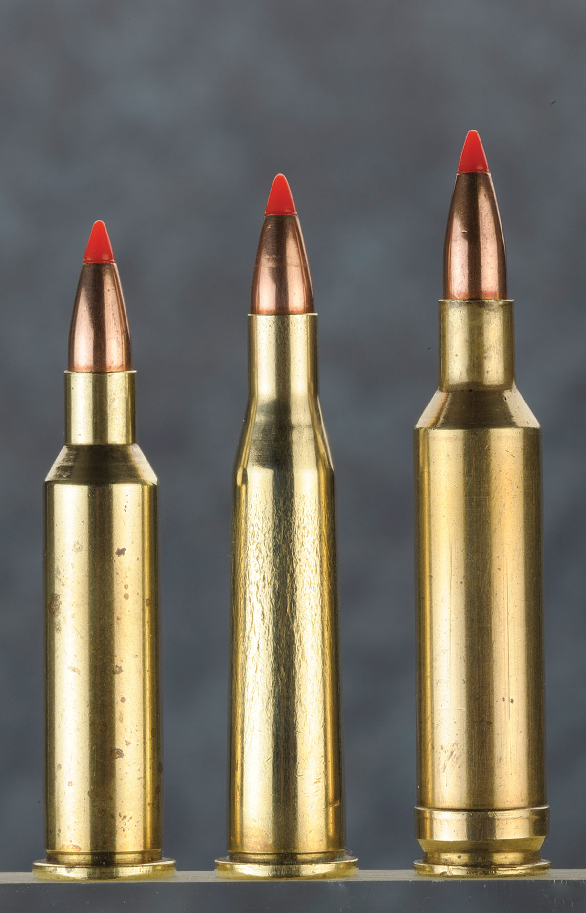 For comparisons, the .219 Donaldson Wasp (left) is shown with the .219 Zipper (middle) and the .224 Ackley Express (right) – all .22-caliber wildcats.